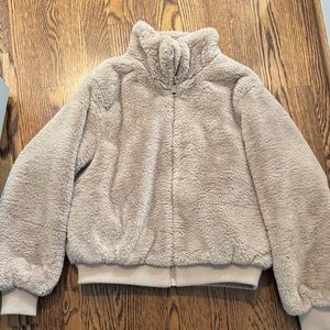 Like new fawn colored faux fur bomber jacket from Zara.